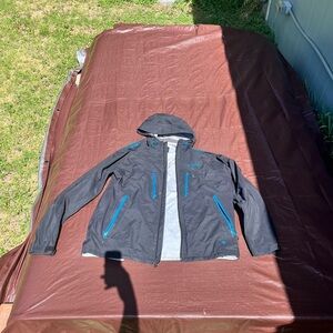 Columbia Men's Black Raincoat with Blue Zippers